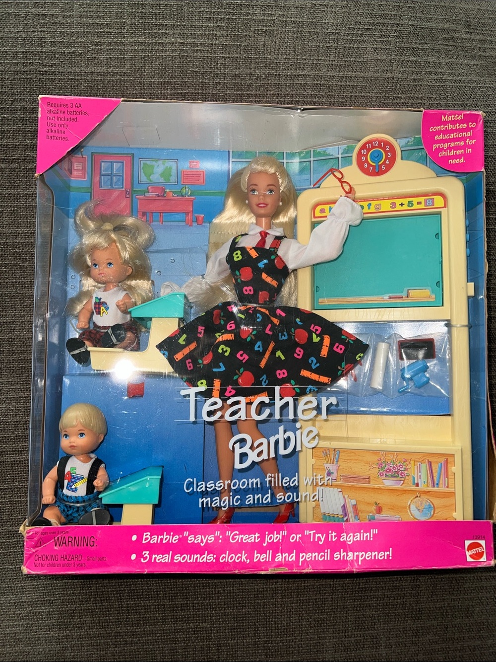 RECALLED VERSION-NIB Barbie Teacher Doll with Black Multicolor Number Dress.